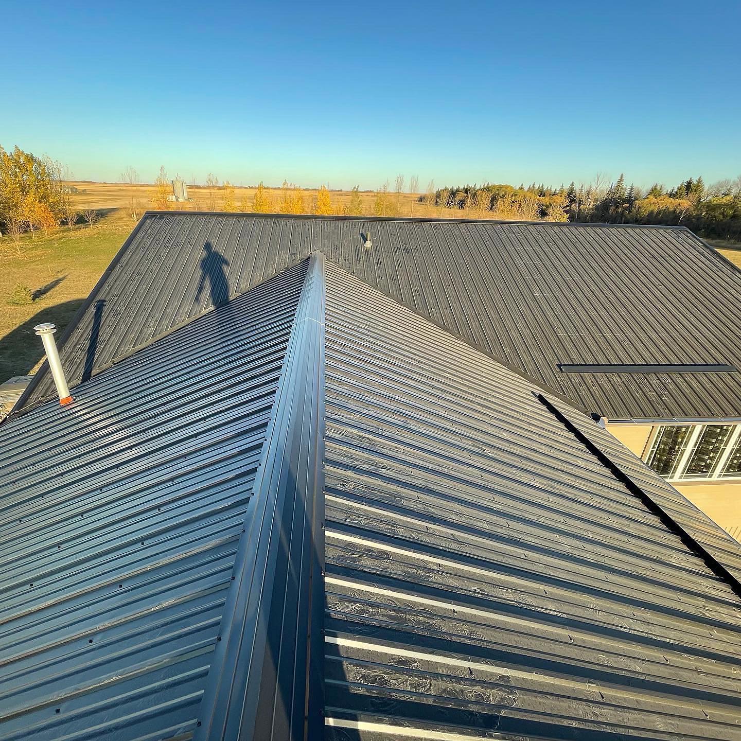 Finished flat commercial roof in Estevan with rooftop units